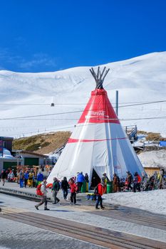 KLEINE SCHEIDEGG - 27 MARCH : Train and hotel with the Eiger at Kleine Scheidegg, Switzerland on March 27, 2017. Kleine Scheidegg is a famous mountain pass attracting many tourists come to playing ski each year.