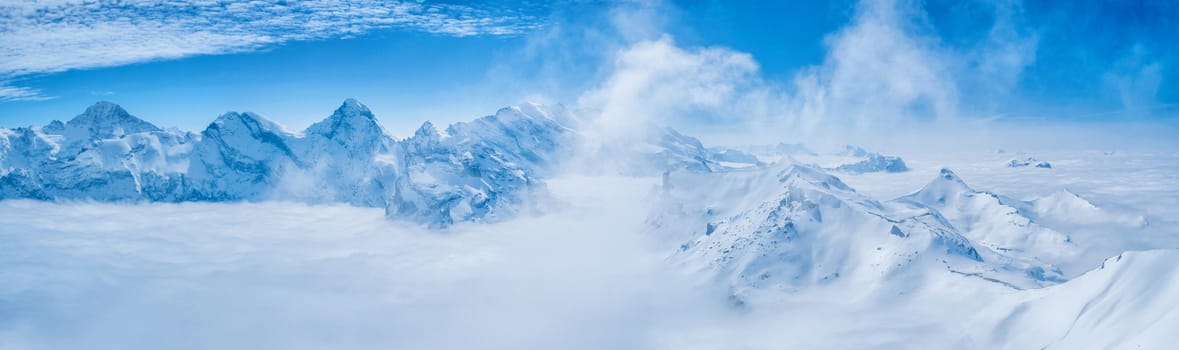 Stunning Panoramic view Snow moutain of the Swiss Skyline from Schilthorn, Switzerland