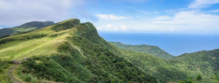 Beautiful grassland, prairie in Taoyuan Valley, Caoling Mountain Trail passes over the peak of Mt. Wankengtou in Taiwan.