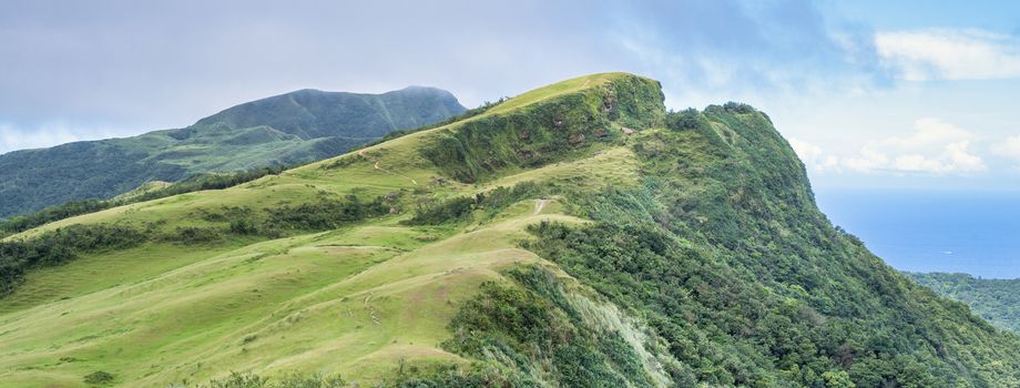 Beautiful grassland, prairie in Taoyuan Valley, Caoling Mountain Trail passes over the peak of Mt. Wankengtou in Taiwan.