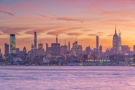 New York City downtown skyline at sunset - beautiful cityscape in USA