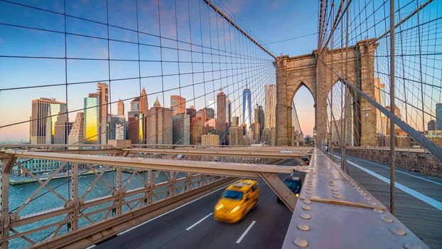 Brooklyn Bridge in New York City, USA at sunrise