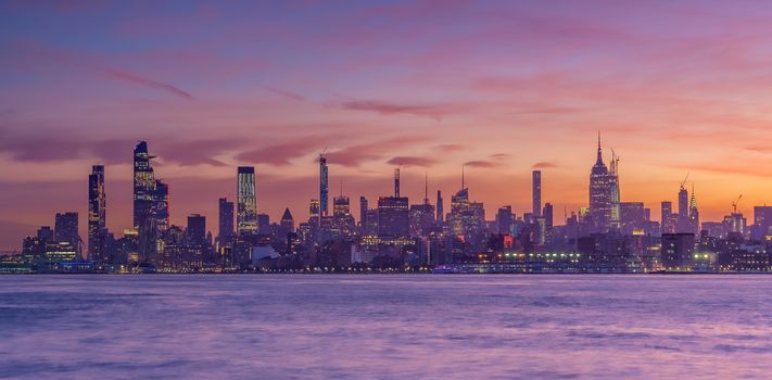 New York City downtown skyline at sunset - beautiful cityscape in USA