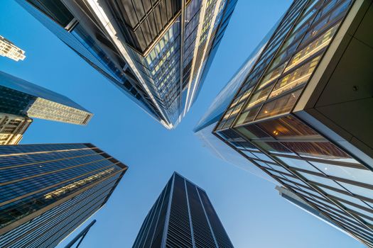 Looking up at business buildings in downtown New York City, USA