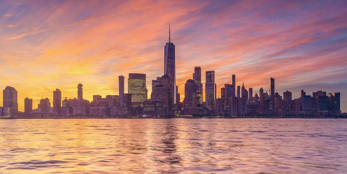 New York City downtown skyline at sunset - beautiful cityscape in USA