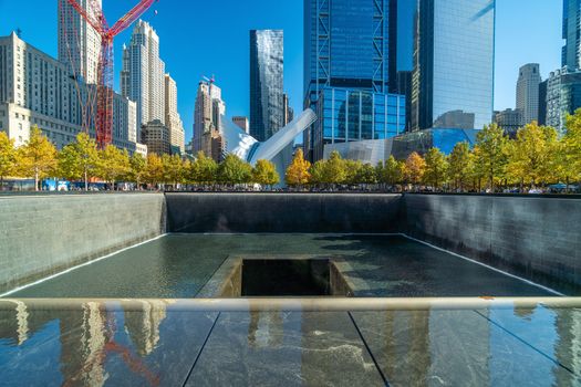 NEW YORK CITY - October 25, 2019 :  9/11 Memorial at World Trade Center Ground Zero in downtown Manhattan, NYC USA