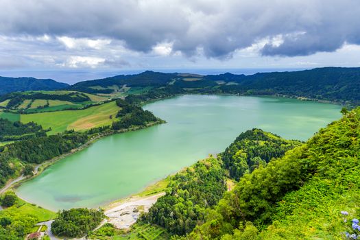View of the Lake Furnas (Lagoa das Furnas) on Sao Miguel Island, Azores, Portugal from the Pico do Ferro scenic viewpoint. Tranquil scene of the lake in a volcanic crater