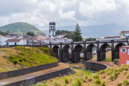 View of the bridge and church tower in Ribeira Grande town, Sao Miguel island, Azores, Portugal.