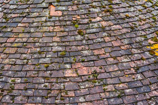 Seamless roof texture of flat red shingles with embedded line patterns.