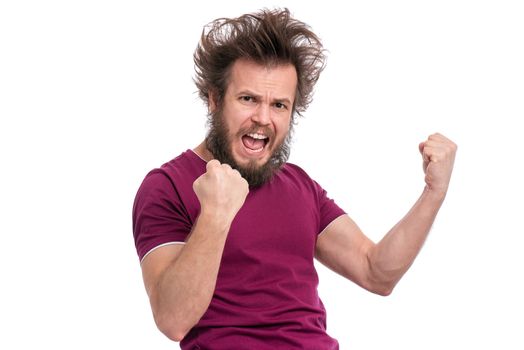 Happy winner. Crazy bearded Man with funny Haircut celebrating his success. Guy make victory gesture, screaming and keeping mouth open, isolated on white background.