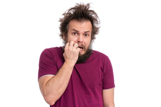 Crazy Scared Man with funny Haircut bites his nails and looks worried. Bearded guy afraid and shocked, isolated on white background. Emotions and signs concept.