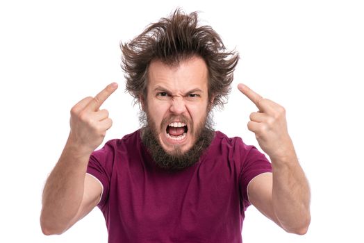 Crazy bearded Man with funny Haircut Screaming and showing the Middle Fingers, isolated on white background. Portrait of Angry Man looking at camera in anger - studio shot.