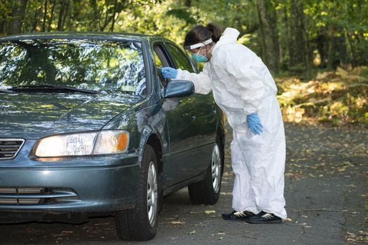 Covid19 Coronavirus healthcare worker performing virus testing outdoors for pandemic