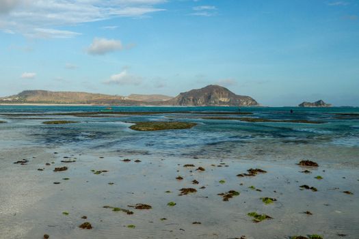 View of Tanjung Aan beach during low tide.