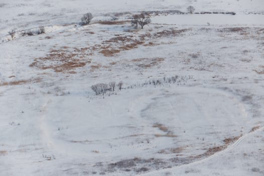 View from above. Agricultural fields in winter.