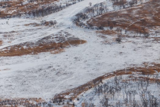 View from above. Agricultural fields in winter.