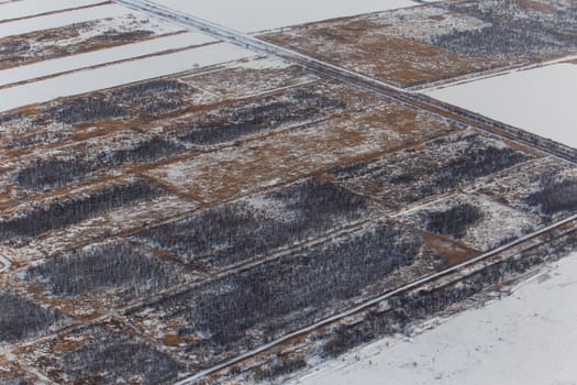 View from above. Agricultural fields in winter.