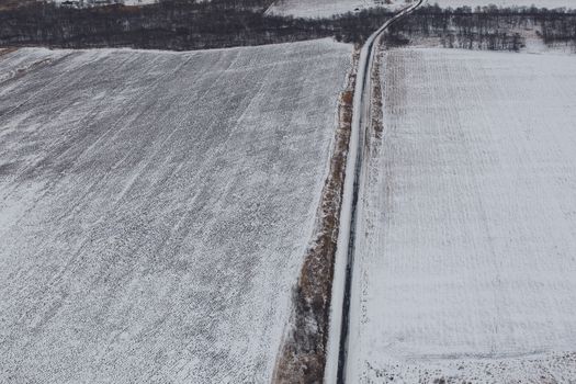 View from above. Agricultural fields in winter.