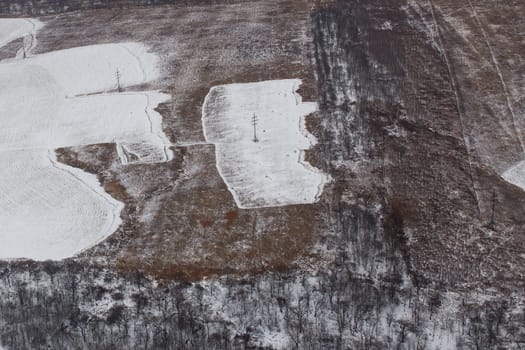 View from above. Agricultural fields in winter.