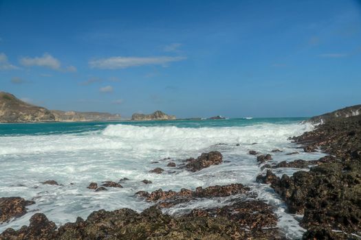 Dramatic coastline and beach on the Marese hill in Tanjung Aan, near Kuta, in south Lombok in Indonesia.