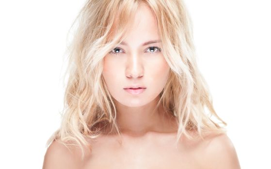 Sensual portrait of young beautiful blonde woman on white background. Sexy topless girl with curly hair looking passionate and tempting. Youth, pure natural beauty and passion.