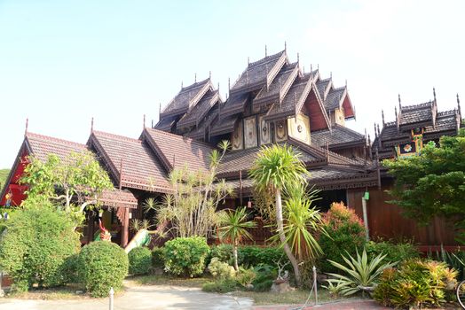 Phayao, Thailand  – 21 December, 2019 : Wat Nantaram is a Tai Yai (Shan-style) community temple in central Chiang Kham and exhibits the classic Tai Yai roof architecture, somewhat extraordinary