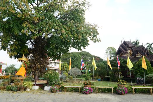 Phayao, Thailand  – 21 December, 2019 : Wat Nantaram is a Tai Yai (Shan-style) community temple in central Chiang Kham and exhibits the classic Tai Yai roof architecture, somewhat extraordinary