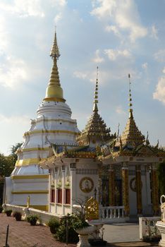 Phayao, Thailand  – 21 December, 2019 : Wat Nantaram is a Tai Yai (Shan-style) community temple in central Chiang Kham District, The brick-and-lime chedi of Tai Yai style