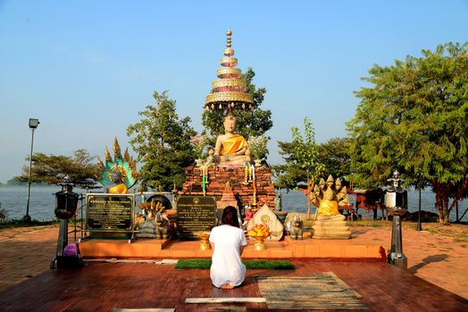  Phayao, Thailand – 21 December, 2019 : Wat Tilok Aram : Year-Old Underwater Temple of Thailand, Today a floating platform with the statue of a Buddha sits directly above the site of the sunken temple.