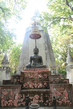 Phayao, Thailand – 21 December, 2019 : Pagoda with black Buddha statue in Wat Analyo Thipayaram
, Phayao province, Thailand