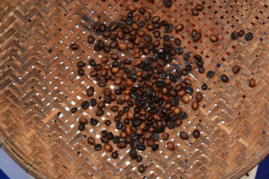 Hand  Roasted coffee on a bamboo tray