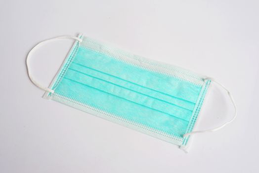 Disposable Hygienic Mask to cover the mouth and nose. Procedure mask from bacteria. Protection concept.