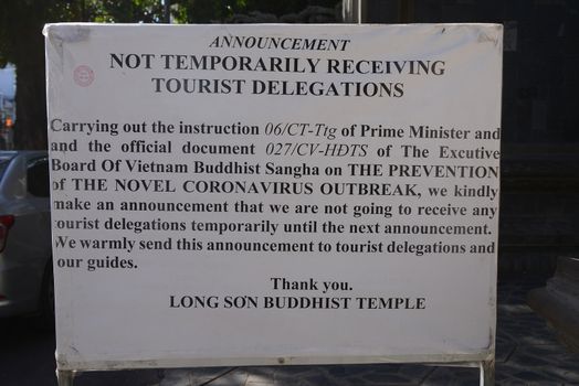 NHA TRANG, VIETNAM – 28 FEBRUARY 2020 : coronavirus outbreak  (COVID-19) notice board from Long Son Buddhism temple