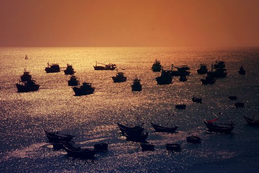 Fishing boat, Fisherman's boat in a sea at sundown