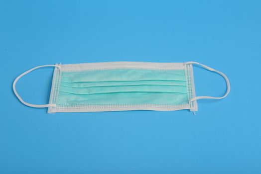 Disposable Hygienic Mask to cover the mouth and nose. Procedure mask from bacteria. Protection concept.