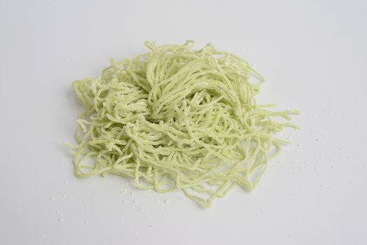 Jade noodle, vegetable noodles, green noodles on white background

