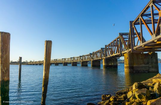 Steel truss railway bridge across Tauranga harbour,  New Zealand.