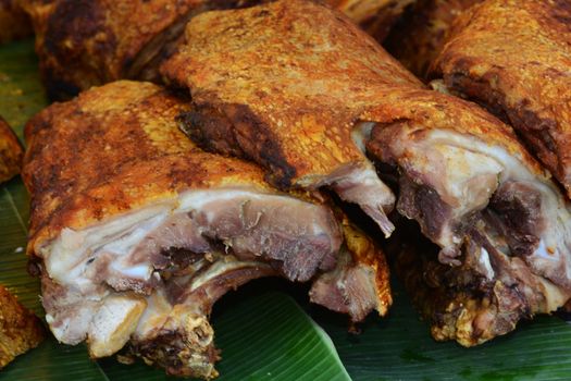 Soft focus of Trang Moo Yang, Roast Pork in Trang, Thailand, The Roasted Pork is rich in its flavor with a thin and crispy pork skin.