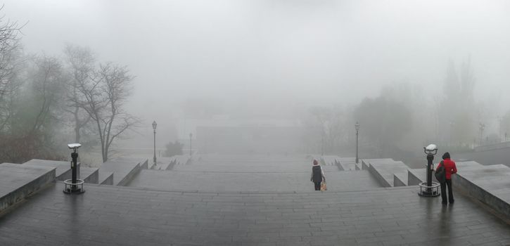 Odessa, Ukraine 11.28.2019.   The Potemkin Stairs on Primorsky Boulevard in Odessa, Ukraine, on a foggy autumn day