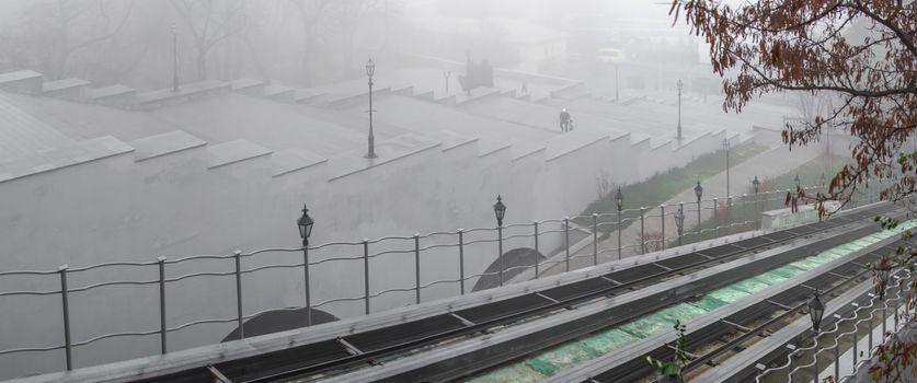 Odessa, Ukraine 11.28.2019.   The Potemkin Stairs on Primorsky Boulevard in Odessa, Ukraine, on a foggy autumn day