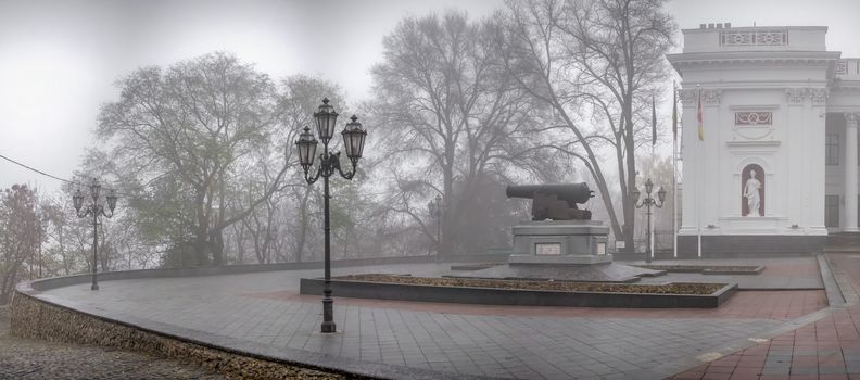 Odessa, Ukraine 11.28.2019.  Monument to the cannon on Primorsky Boulevard in Odessa, Ukraine, on a foggy autumn day