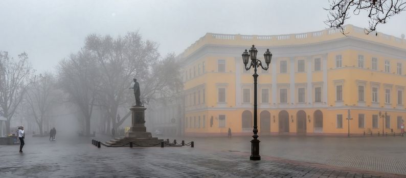 Odessa, Ukraine 11.28.2019.   Primorsky Boulevard in Odessa, Ukraine, on a foggy autumn day