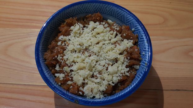 Closeup view of traditional  tasty sweet dessert called Suji Halwa or Halva, made of Semolina at home in south Asian countries with different dry fruit ingredients