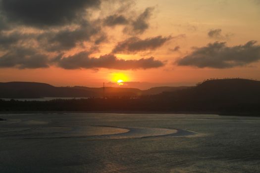 Sunrise at tanjung aan, kuta lombok beach, lombok, indonesia.