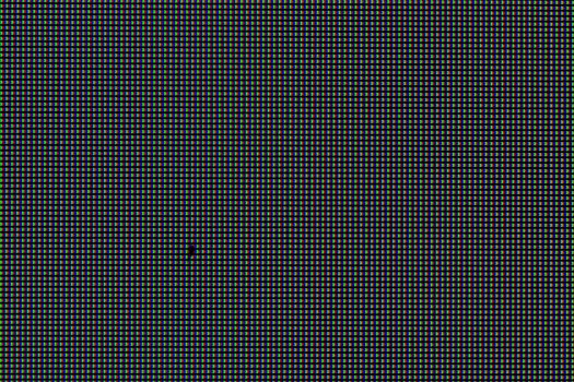 true macro photo of ips lcd screen structure with surface black defect or dent.