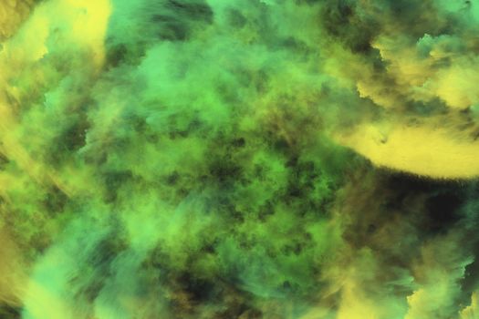 Abstract image of exploded powder in green and yellow, digital illustration