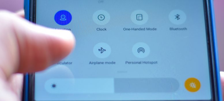 mobility and modern lifestyle concept: human checking to click airplane mode