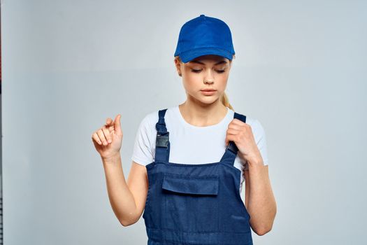 Woman in working uniform blue cap service lifestyle service. High quality photo