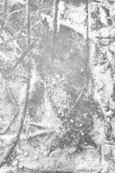 Ice rink floor. Ice background with marks from skating and hockey. Winter sports wallpaper.