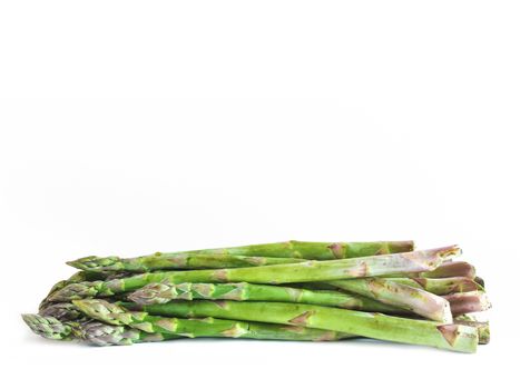 Uncooked asparagus isolated on white background